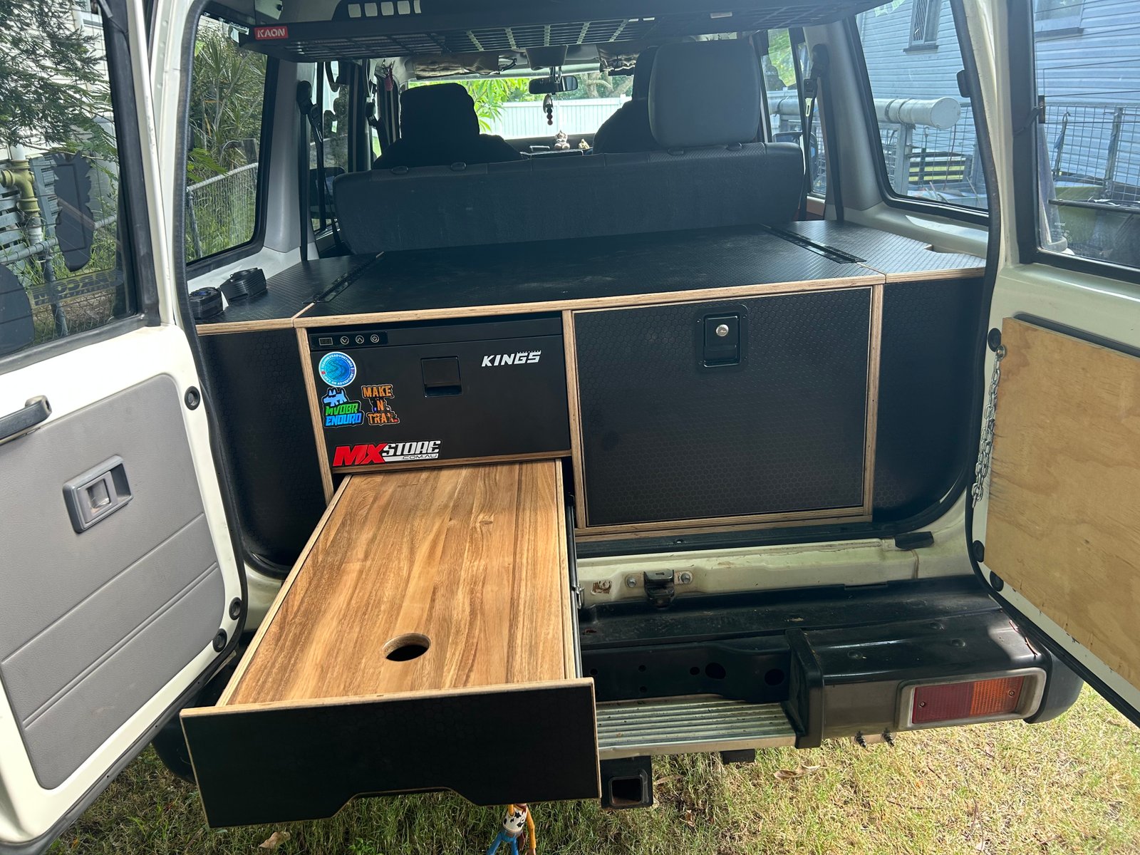 4WD drawer system with Kings fridge and timber pull-out surface — touring cargo fit-out by TAWL